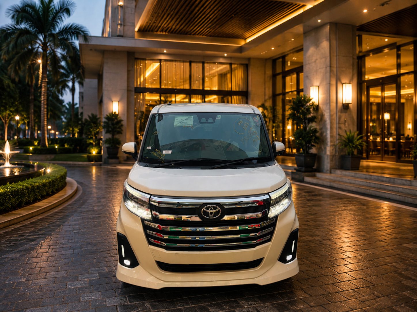 Front view of the Toyota Roomy tour vehicle